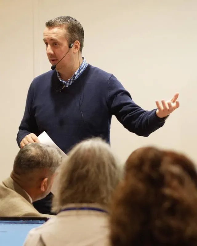 James Nicholson speaking to a room of business owners